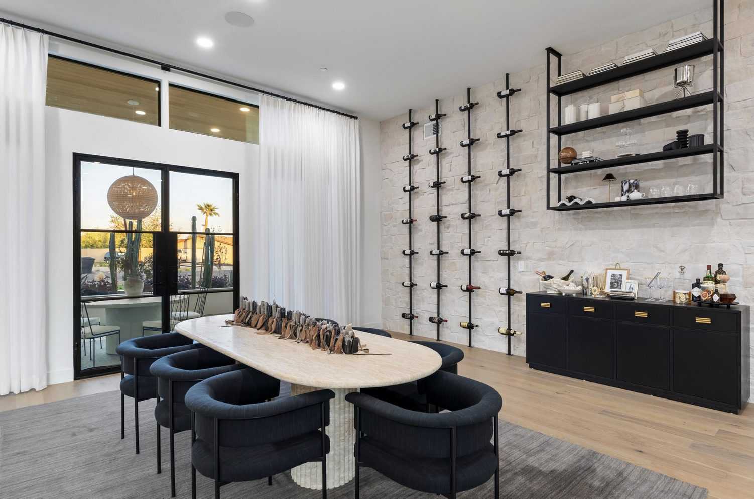 Dining room with a stone wine wall